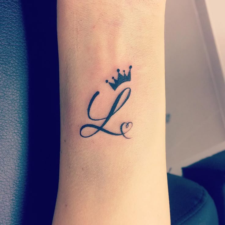 55 Charming Initial Tattoo Designs - Keep a Loved One Closer to Your Heart  Check more at http://tattoo-journal.com/best-initial-tattoo/