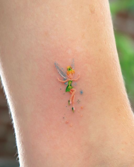 OVENLEE 🍃 ChaeheeLee on Instagram: "Teeny tiny tinkerbell ✨  #tinkerbelltattoo #tinkerbell #cutetattoo #minitattoo #tattoooftheday  #smalltattoosforgirls #latattooartist"