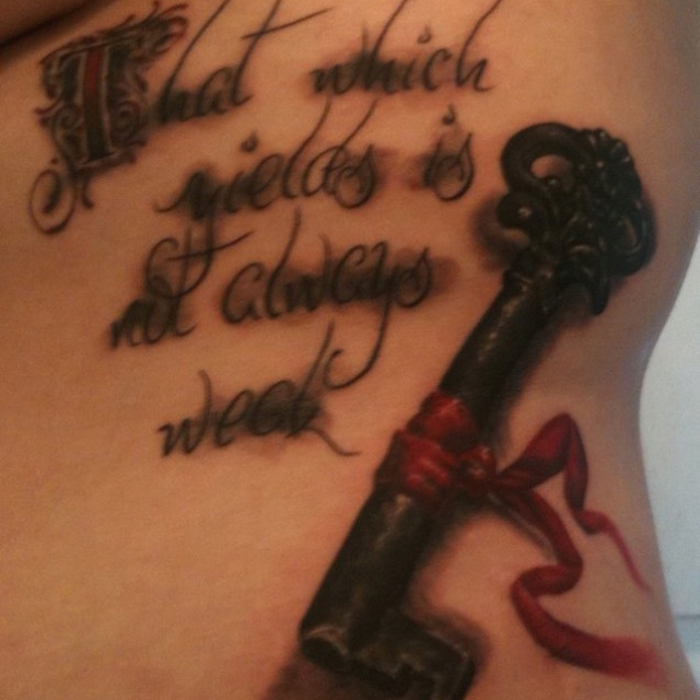 This quote with the Kushiel's Dart rose tattoo instead of the key