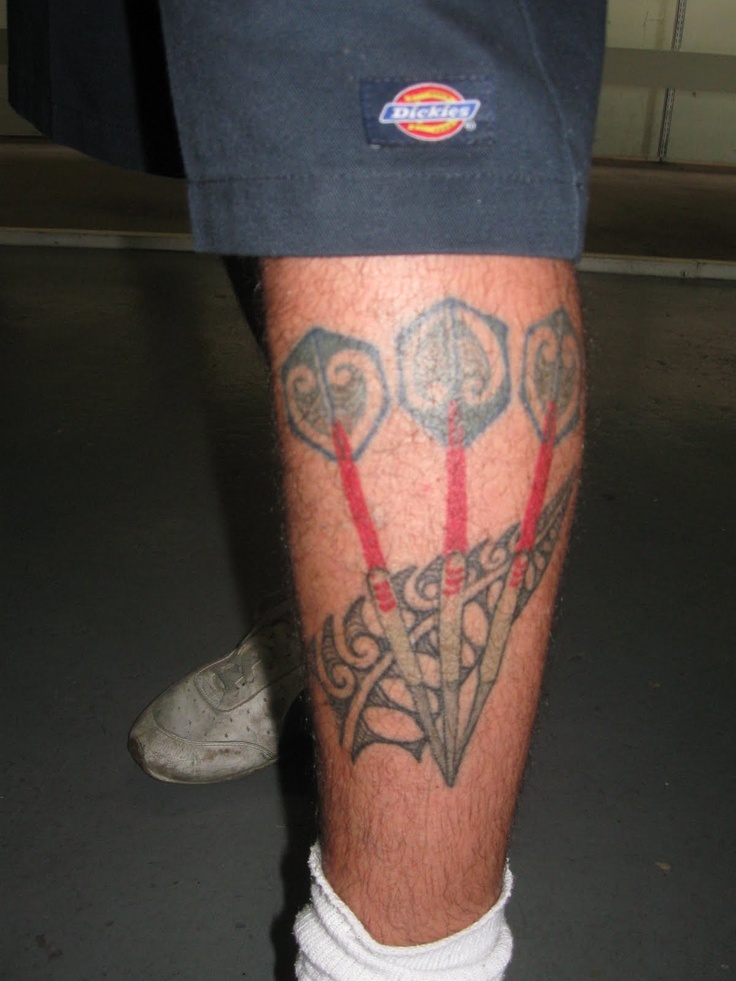 Darts tattoo on leg ...