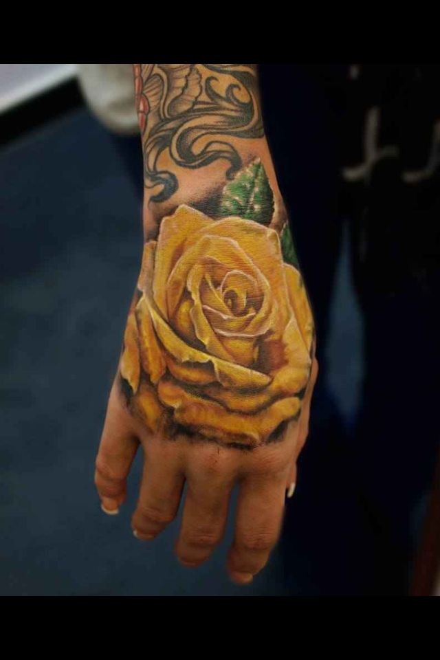 Pin by Cheyenne Starker on Tattoos | Yellow rose tattoos, Rose hand tattoo,  Finger rose tattoo