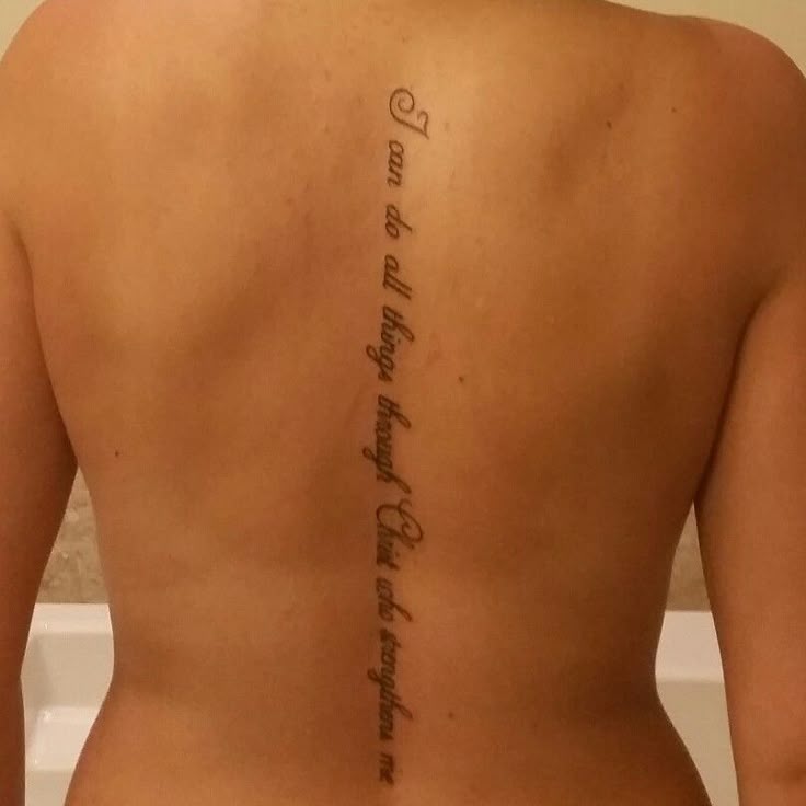 Philippians 4:13 spine tattoo