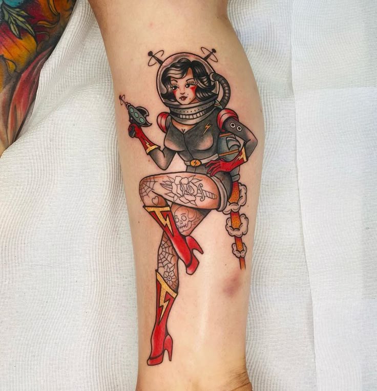BLACK EAGLE TATTOOS on Instagram: "Space girl by @blackeagletattoos #traditionalpinuptattoo #oldschoolpinuptattoo #pinupstyle #pinuptattoo #spacegirl #spacepin… |