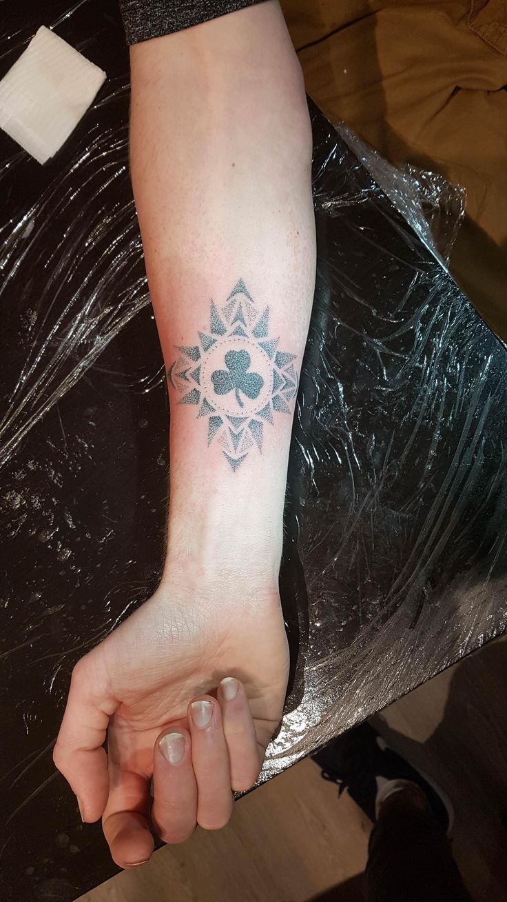 Traditional handpoked boston celtics geometric design