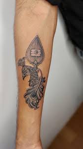 The Murugan Vel and Peacock tattoo represents divine strength and grace, a perfect blend of power and beauty., 📞 +91 9916290356 | +91 866-0678303, 📍 Bangalore & Chennai , #tattoo #godtattoo #sacred ...