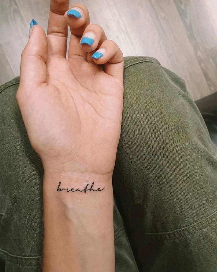Inspirational Ink 'Breathe' Lettering Script Tattoo on the Inner Wrist