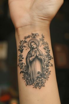 Minimalist Virgin Mary Tattoo