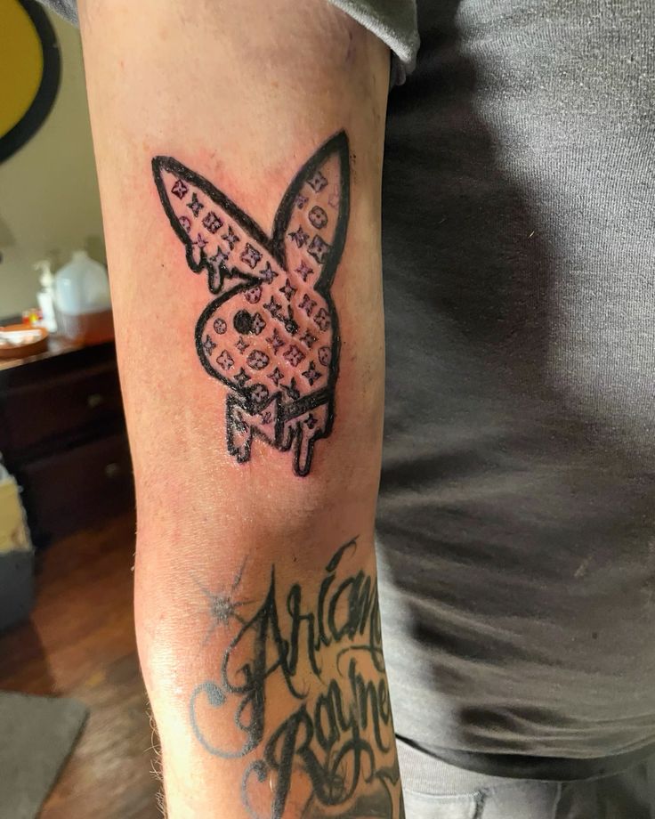 Dripping Playboy bunny/ Louis Vuitton tattoo