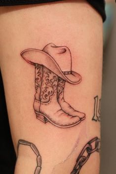 Cowboy Hat and Boots Tattoo Design