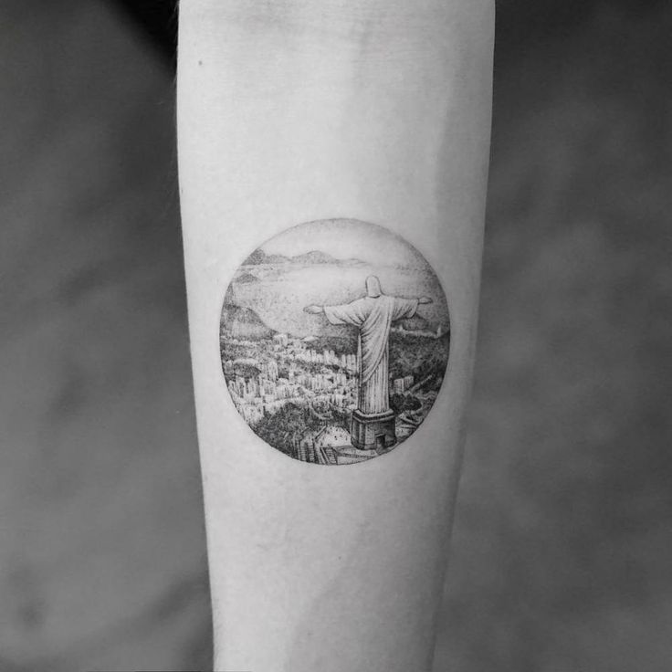 Rio de Janeiro landscape tattoo on the inner forearm.