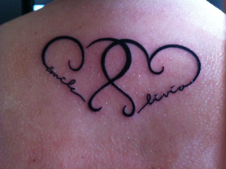 Tattoo of my kid's name.