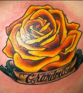 Simple quote and yellow rose tattoo